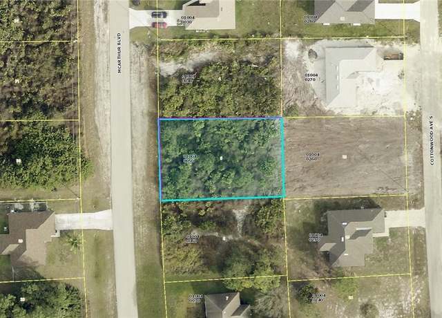 Property at 511 Mcarthur Blvd, Lehigh Acres, FL 33974