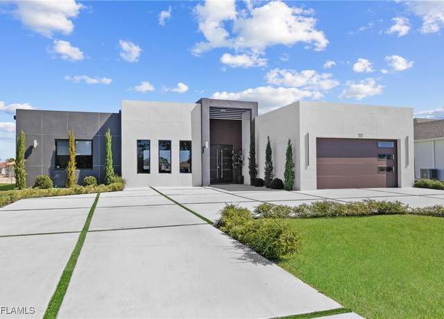Property at 511 NE 5th Ave, Cape Coral, FL 33909, 4 beds, 3 baths