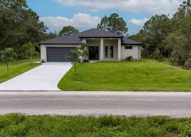 Property at 607 Mcarthur Ave, Lehigh Acres, FL 33936, 4 beds, 2 baths