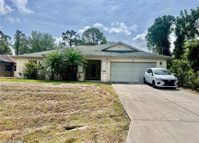 Property at 713 Crestline Ave S, Lehigh Acres, FL 33974, 3 beds, 2 baths