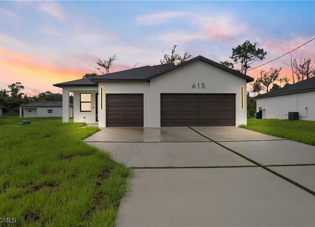 Property at 615 Greenbriar Blvd, Lehigh Acres, FL 33972, 3 beds, 2 baths
