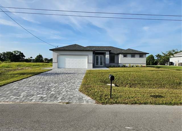 Property at 1410 NE 6th Ave, Cape Coral, FL 33909, 4 beds, 3 baths