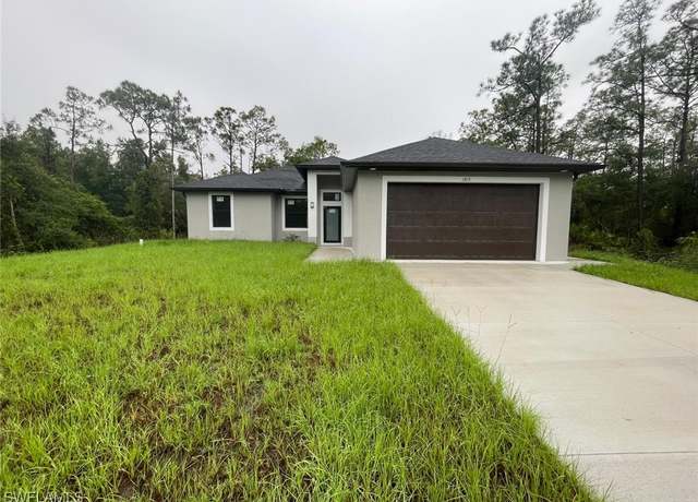 Property at 2813 52nd St SW, Lehigh Acres, FL 33976, 3 beds, 2 baths