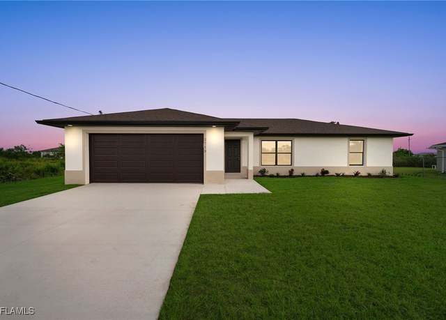 Property at 2808 70th St W, Lehigh Acres, FL 33971, 3 beds, 2 baths