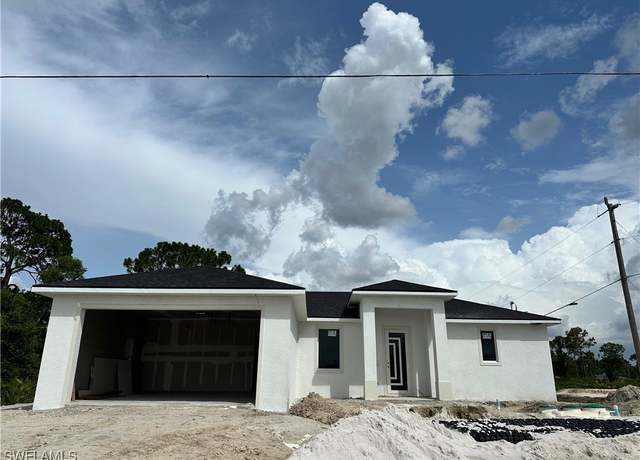 Property at 938 Grant Blvd, Lehigh Acres, FL 33974, 3 beds, 2.5 baths