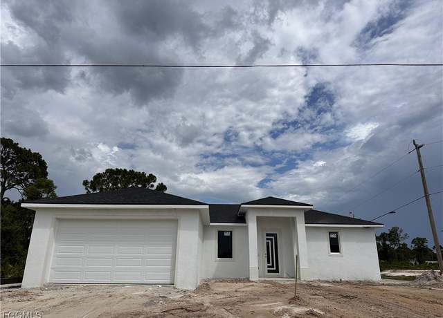 Property at 938 Grant Blvd, Lehigh Acres, FL 33974, 3 beds, 2.5 baths