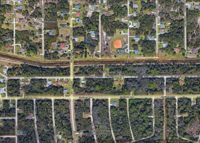Property at 1011 Asther St E, Lehigh Acres, FL 33974