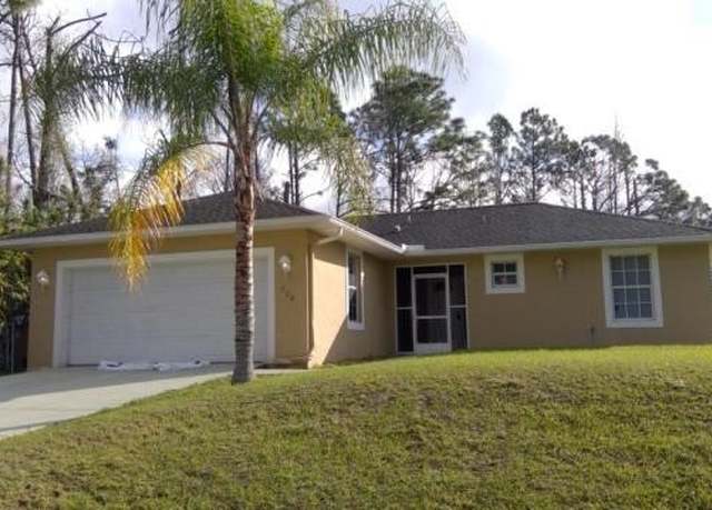 Property at 709 Puccini Ave S, Lehigh Acres, FL 33974, 3 beds, 2 baths