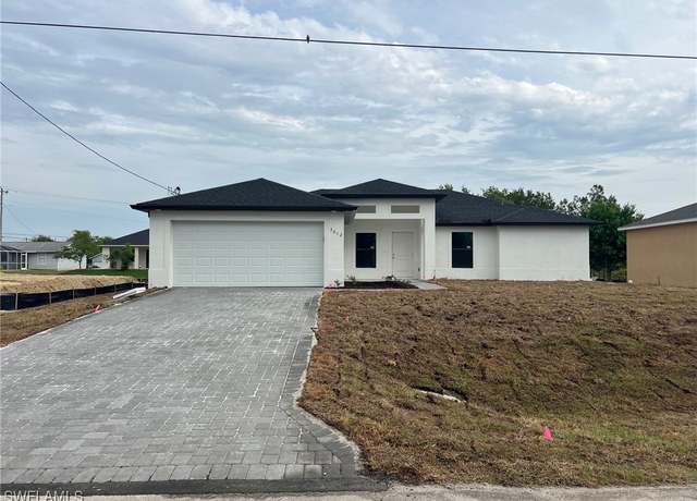 Property at 3012 9th St SW, Lehigh Acres, FL 33976, 4 beds, 2 baths