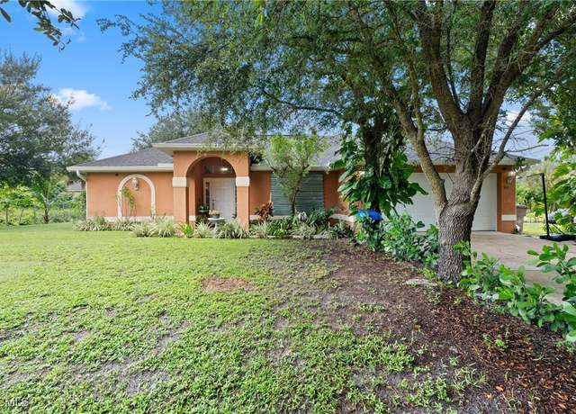 Property at 703 E 7th St, Lehigh Acres, FL 33972, 3 beds, 2 baths