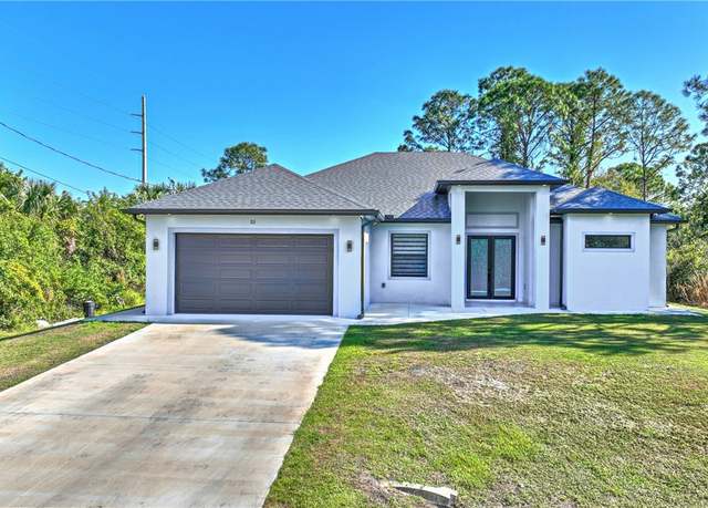 Property at 53 Gene Ave S, Lehigh Acres, FL 33976, 4 beds, 2 baths