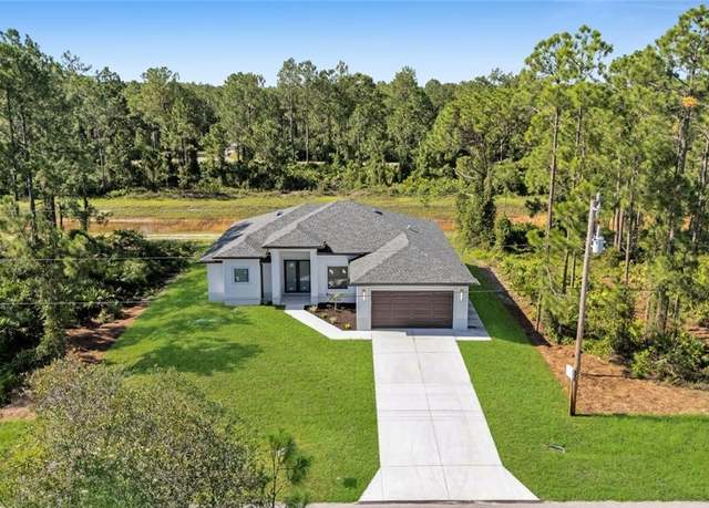 Property at 542 Ames St E, Lehigh Acres, FL 33974, 3 beds, 2 baths