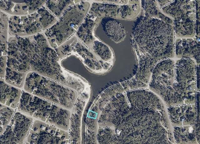 Property at 457 Burrstone Dr, Lehigh Acres, FL 33974