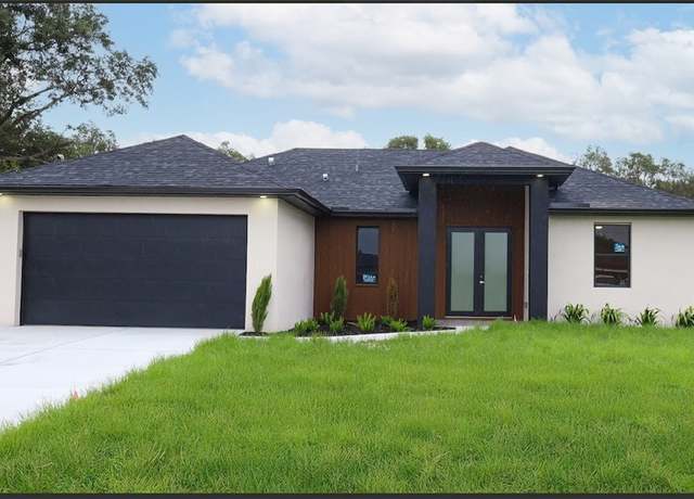 Property at 607 Pelee Ave, Lehigh Acres, FL 33974, 3 beds, 2 baths