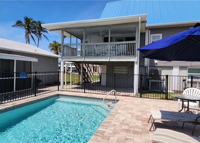Property at 144 Driftwood Ln, Fort Myers Beach, FL 33931, 5 beds, 4 baths