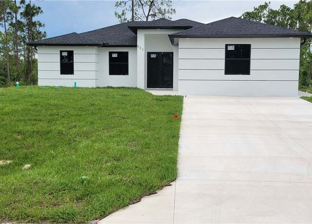 Property at 607 Hutton St, Lehigh Acres, FL 33974, 4 beds, 3 baths