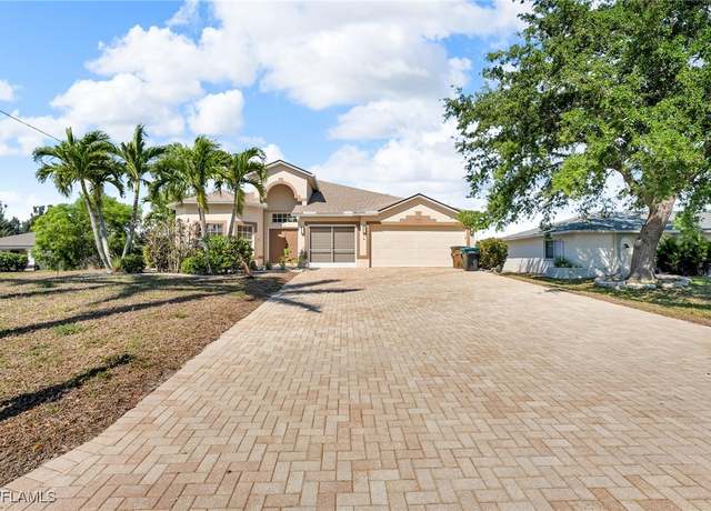 Property at 106 SW 33rd Ave, Cape Coral, FL 33991, 4 beds, 3 baths