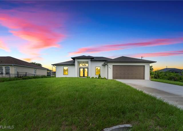 Property at 856 Jaguar Blvd, Lehigh Acres, FL 33974, 4 beds, 2 baths