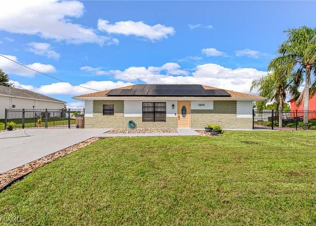 Property at 3104 26th St SW, Lehigh Acres, FL 33976, 3 beds, 2 baths