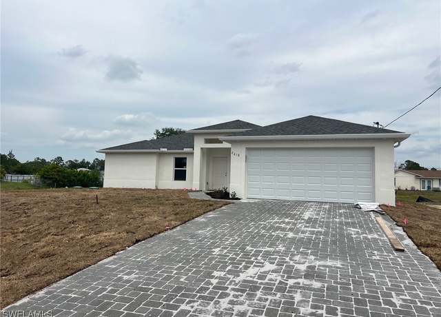 Property at 2618 10th St SW, Lehigh Acres, FL 33976, 4 beds, 2 baths