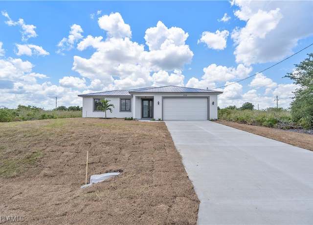 Property at 516 Kilarney Ave S, Lehigh Acres, FL 33974, 4 beds, 3 baths