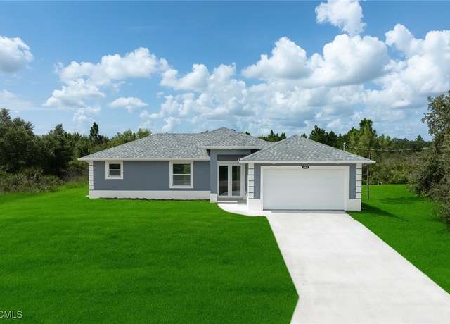 Property at 1004 E 10th St, Lehigh Acres, FL 33972, 3 beds, 2 baths