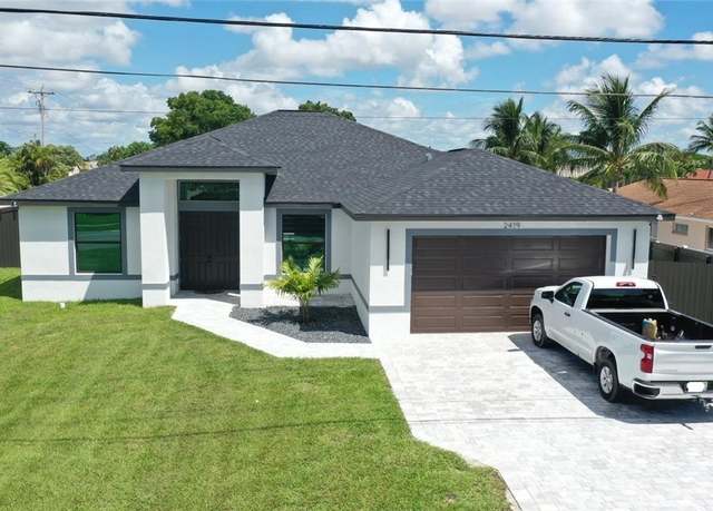 Property at 2419 Country Club Blvd, Cape Coral, FL 33990, 4 beds, 3 baths