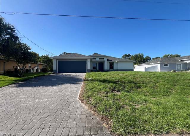 Property at 3211 25th St SW, Lehigh Acres, FL 33976, 4 beds, 2 baths