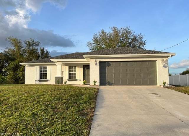 Property at 2806 35th St SW, Lehigh Acres, FL 33976, 3 beds, 2 baths