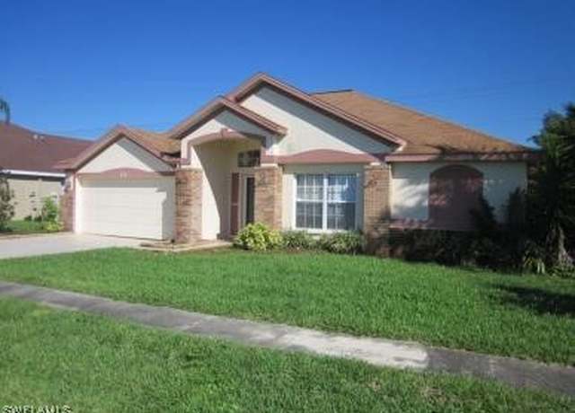 Property at 4556 Varsity Cir, Lehigh Acres, FL 33971, 3 beds, 2 baths