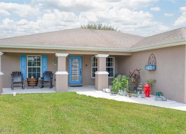 Property at 1039 Harwood Ave S, Lehigh Acres, FL 33974, 3 beds, 2 baths