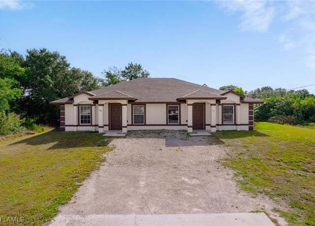 Property at 709/711 Harold Ave S, Lehigh Acres, FL 33973, 6 beds, 4 baths