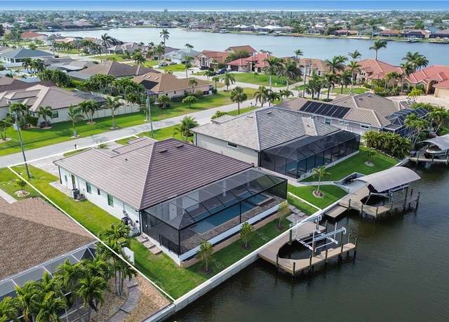Property at 4411 SW 11th Ave, Cape Coral, FL 33914, 4 beds, 4.5 baths