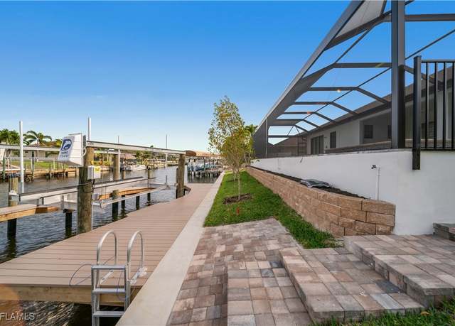 Property at 4411 SW 11th Ave, Cape Coral, FL 33914, 4 beds, 4.5 baths