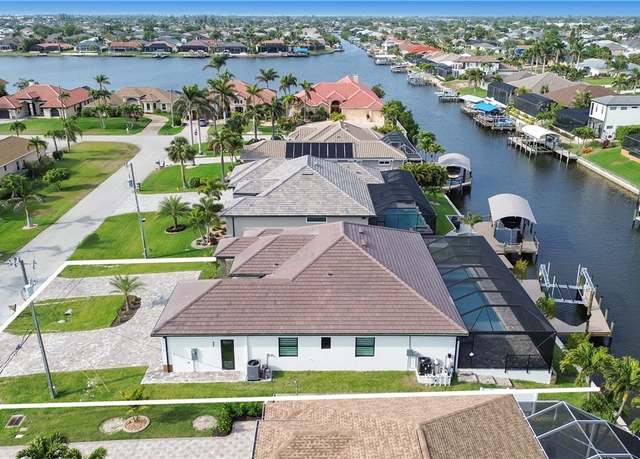 Property at 4411 SW 11th Ave, Cape Coral, FL 33914, 4 beds, 4.5 baths