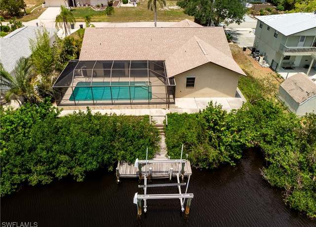 Property at 5127 Genesee Pkwy, Bokeelia, FL 33922, 3 beds, 3 baths