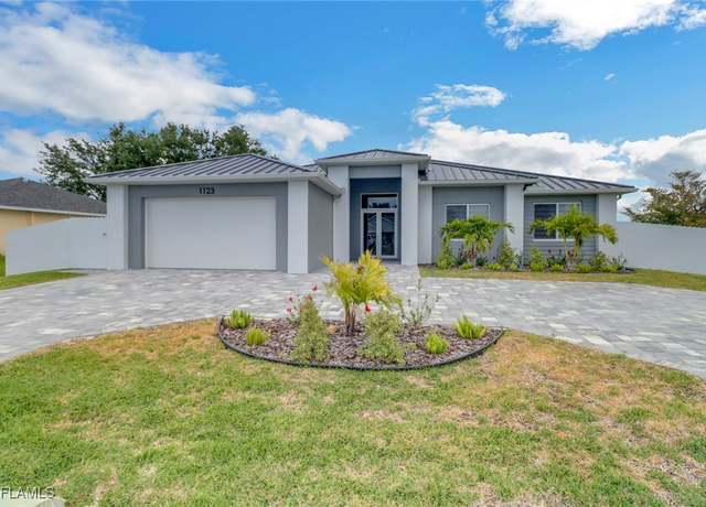 Property at 1123 NE 10th St, Cape Coral, FL 33909, 4 beds, 3 baths