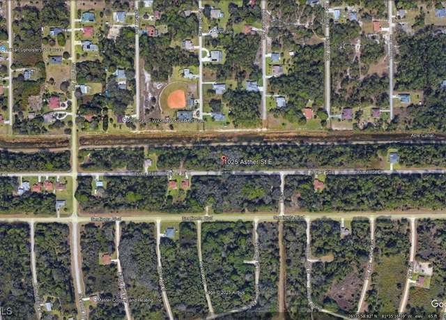 Property at 1025 Asther St E, Lehigh Acres, FL 33974