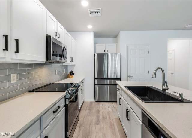 Property at 14965 Wildflower Cir, Naples, FL 34119, 3 beds, 2.5 baths