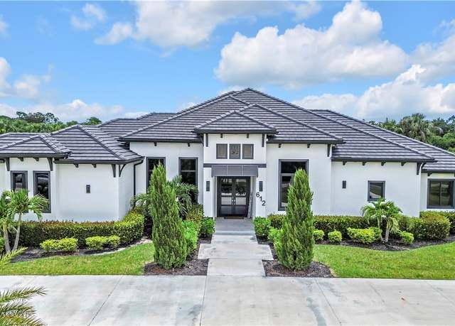 Property at 612 Poinsettia Ave, Lehigh Acres, FL 33972, 6 beds, 3.5 baths
