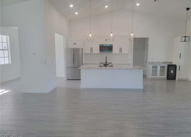 Property at 1107 Hibiscus Ave, Lehigh Acres, FL 33972, 4 beds, 2 baths