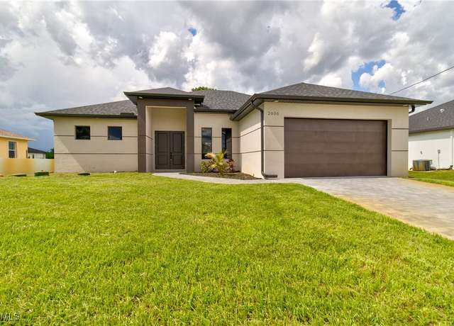 Property at 2606 25th St SW, Lehigh Acres, FL 33976, 3 beds, 2 baths