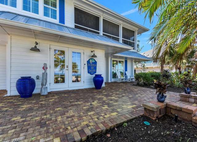 Property at 8315 Main St, Bokeelia, FL 33922, 2 beds, 3 baths