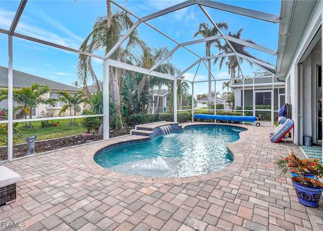 Property at 1741 Emerald Cove Cir, Cape Coral, FL 33991, 4 beds, 2.5 baths