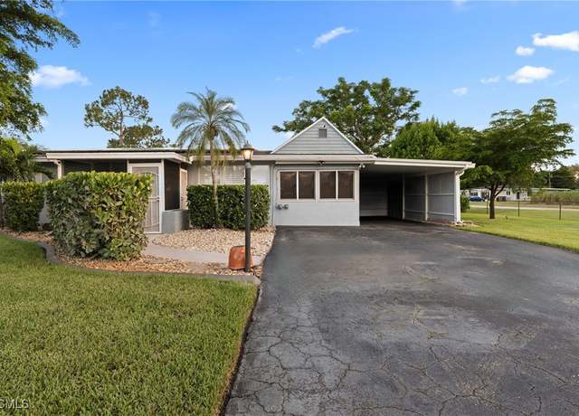 Property at 402 E Cleveland Ln, Lehigh Acres, FL 33936, 3 beds, 2 baths