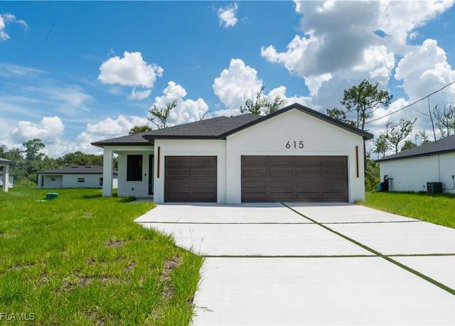 Property at 615 Greenbriar Blvd, Lehigh Acres, FL 33972, 3 beds, 2 baths