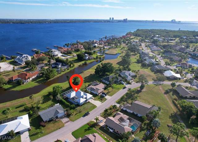 Property at 6330 Pga Dr, North Fort Myers, FL 33917, 4 beds, 3 baths