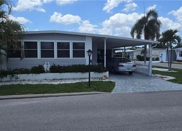 Property at 585 Hogan Dr, North Fort Myers, FL 33903, 2 beds, 2 baths