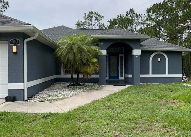 Property at 910 Hollister Ave, Lehigh Acres, FL 33974, 4 beds, 2 baths
