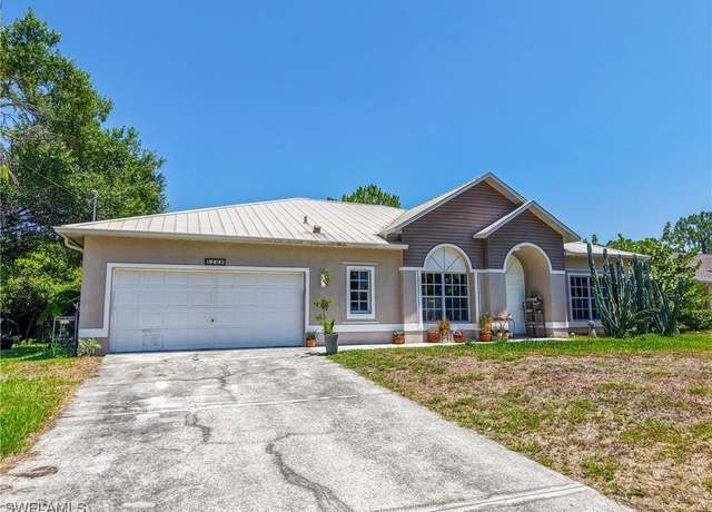 Property at 5208 Bygone St, Lehigh Acres, FL 33971, 3 beds, 2 baths